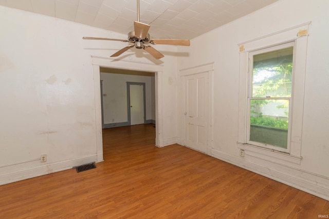 1815 Elwood Ave, South Bend, IN 46628 - empty room with light wood finished floors, ceiling fan, and baseboards