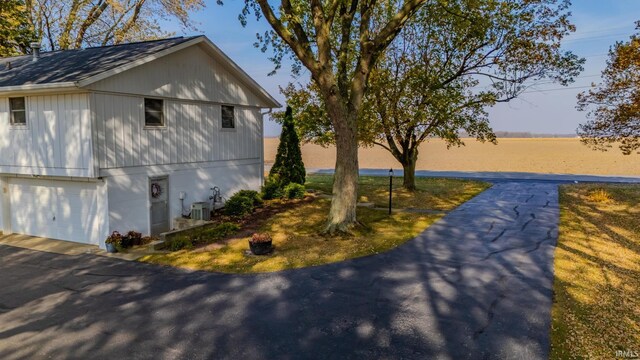 view of home's exterior with a garage