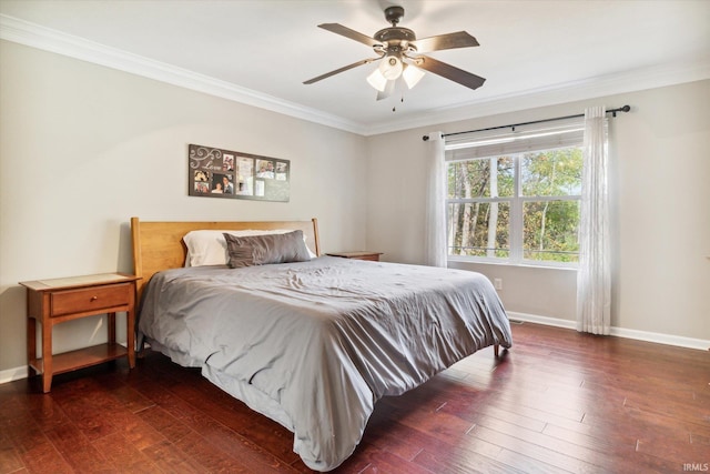 bedroom featuring ceiling fan, crown molding, and dark hardwood / wood-style floors