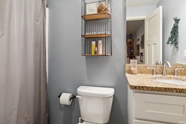 313 Tiger Ct, New Carlisle, IN 46552 - full bathroom with toilet, vanity, and curtained shower