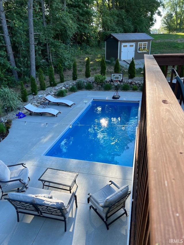 313 Tiger Ct, New Carlisle, IN 46552 - swimming pool featuring an outdoor structure and a patio area