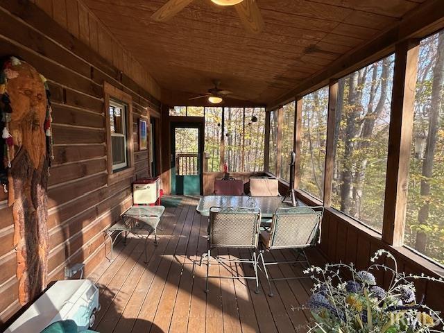 3210 Cedar Gap Ln, Birdseye, IN 47513 - sunroom / solarium with ceiling fan and outdoor dining space
