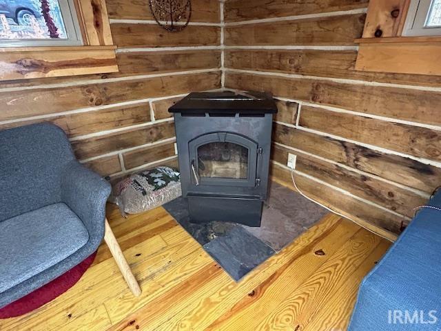 3210 Cedar Gap Ln, Birdseye, IN 47513 - detailed view of a wood stove and wooden walls
