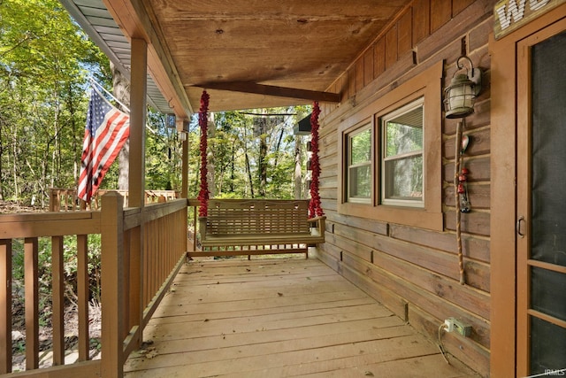 3210 Cedar Gap Ln, Birdseye, IN 47513 - wooden terrace featuring covered porch