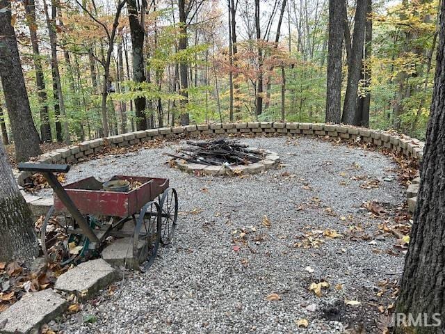3210 Cedar Gap Ln, Birdseye, IN 47513 - view of patio featuring a fire pit