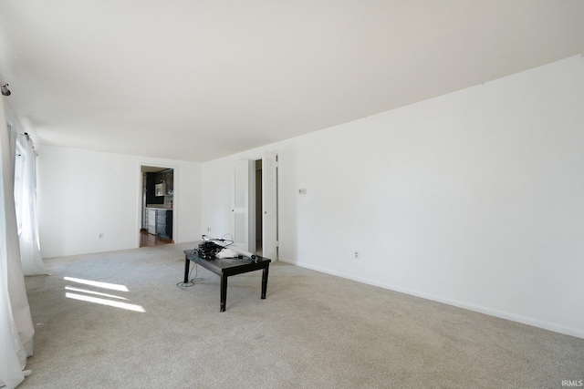 empty room with light colored carpet