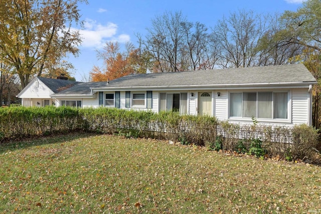 single story home with a front yard