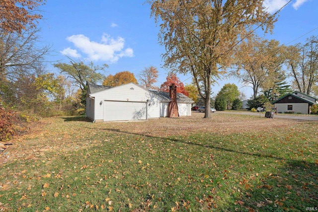 view of yard featuring a garage