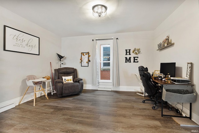 home office with wood-type flooring