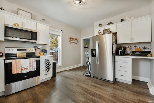 kitchen featuring white cabinetry, stainless steel appliances, and dark hardwood / wood-style floors