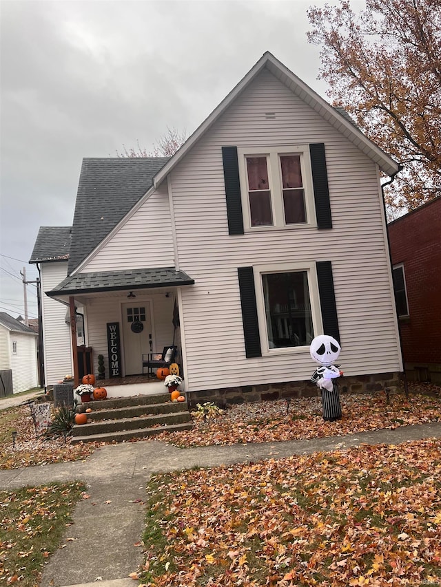 back of house with a porch