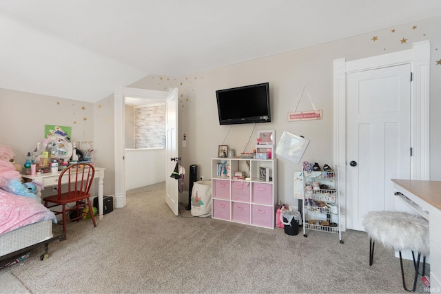 carpeted bedroom with vaulted ceiling