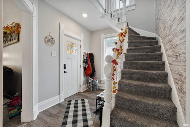 foyer with dark wood-type flooring