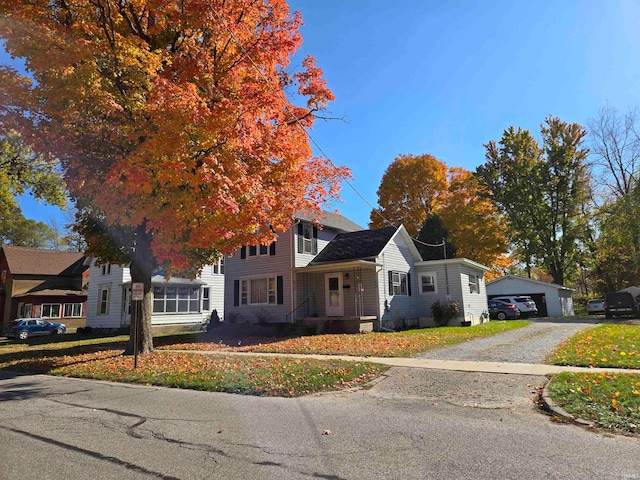 view of front of property with an outbuilding and a garage