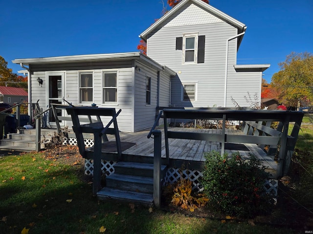 rear view of house with a deck