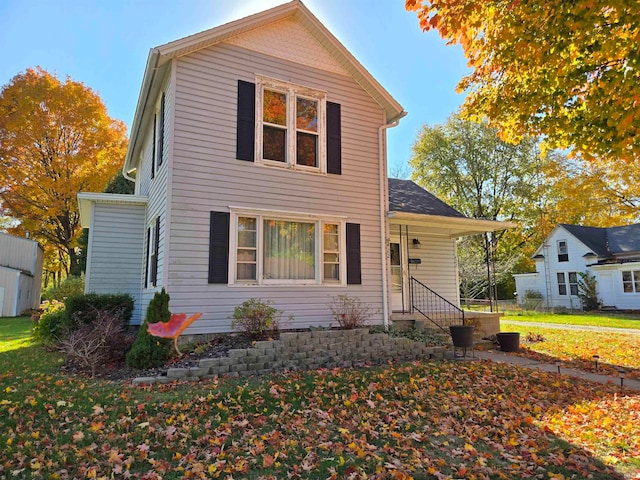 view of front property with a front lawn