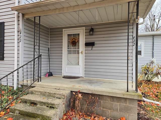 entrance to property with covered porch