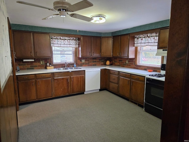 kitchen featuring sink, range with gas cooktop, dishwasher, and ceiling fan