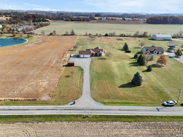 aerial view with a water view and a rural view