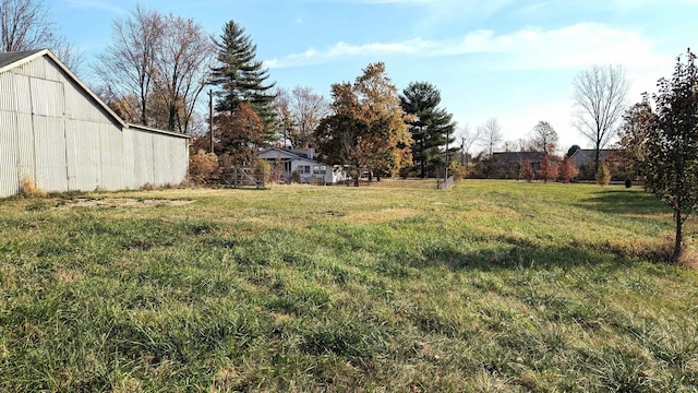 1911 Kroemer Rd, Fort Wayne, IN 46808 - view of yard featuring a barn and an outbuilding
