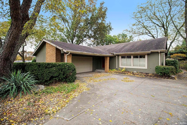 single story home with a garage