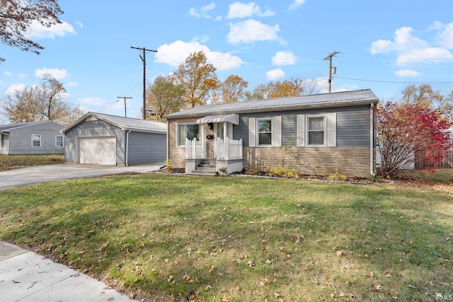 view of front of house with an outdoor structure, a garage, and a front lawn