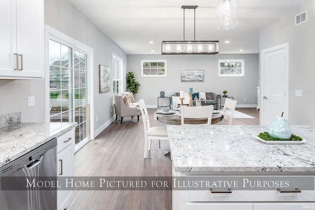 dining area with light hardwood / wood-style flooring