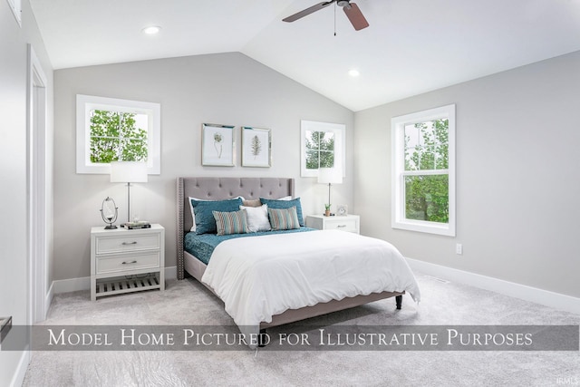 carpeted bedroom featuring ceiling fan and lofted ceiling