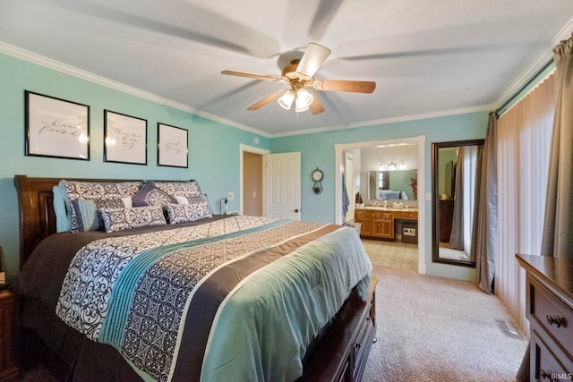 carpeted bedroom with connected bathroom, ornamental molding, and ceiling fan