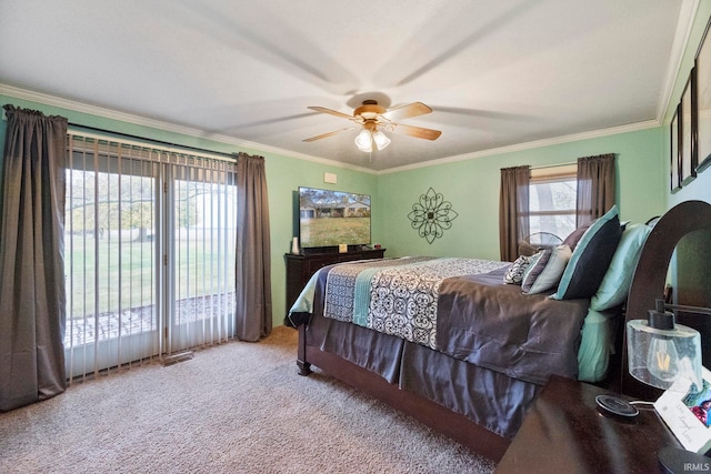 bedroom featuring ornamental molding, carpet, access to exterior, and ceiling fan