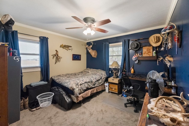 bedroom with ornamental molding, light colored carpet, and ceiling fan