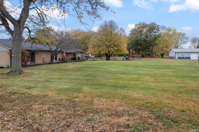 view of yard with a playground