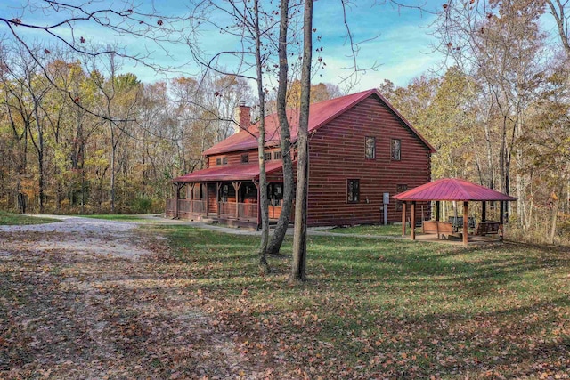 view of home's exterior with a lawn