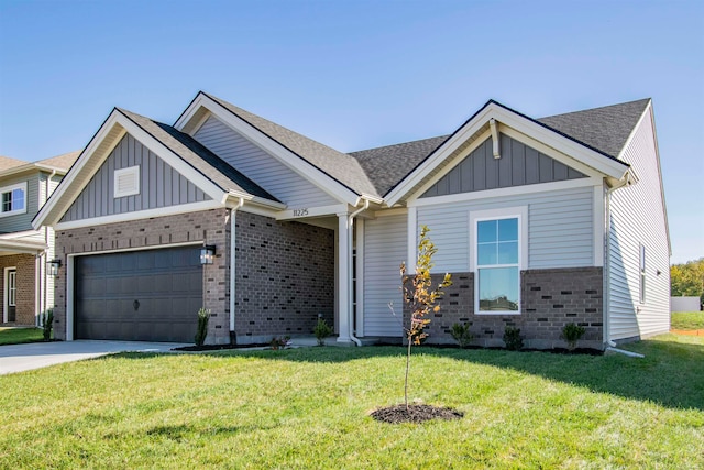 craftsman-style house with a garage and a front lawn