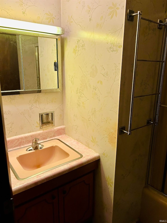 bathroom featuring vanity and walk in shower