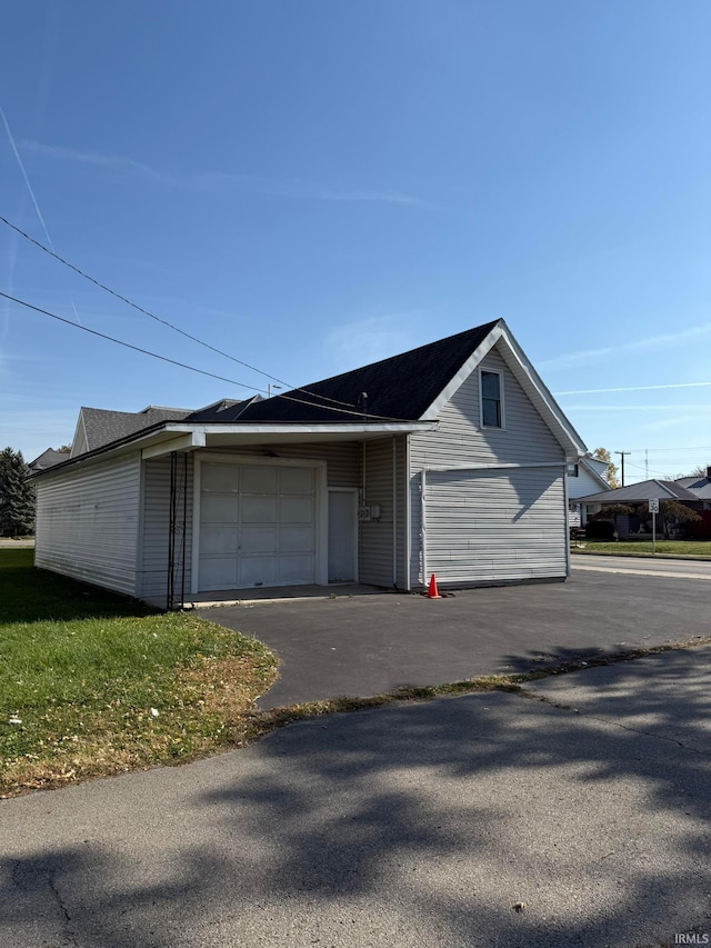 exterior space featuring a garage