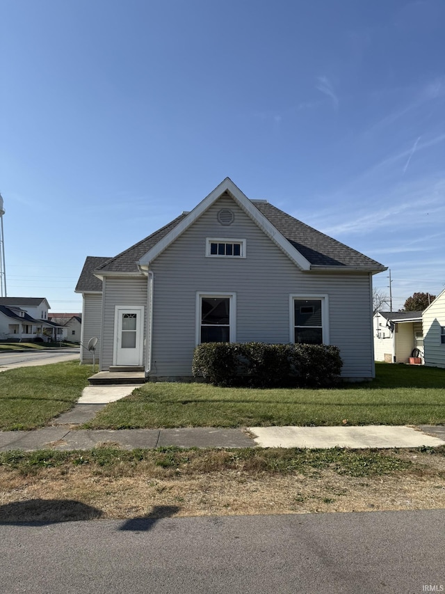 422 E Water St A-B, Unit A-B Portland, IN 47371 - view of front of property with a shingled roof and a front yard