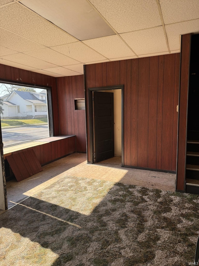 422 E Water St A-B, Unit A-B Portland, IN 47371 - carpeted spare room with a drop ceiling and wood walls