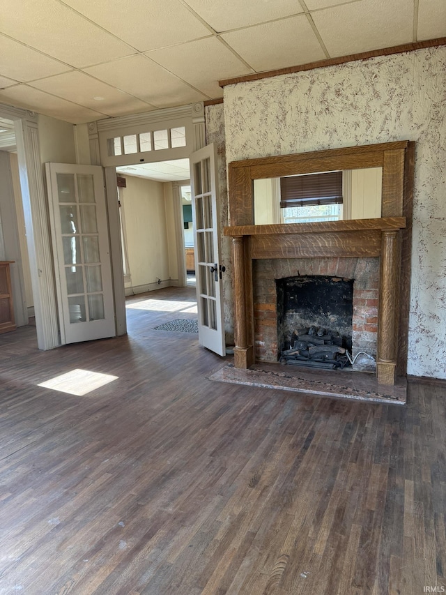422 E Water St A-B, Unit A-B Portland, IN 47371 - unfurnished living room featuring wood finished floors, french doors, a fireplace, and a paneled ceiling