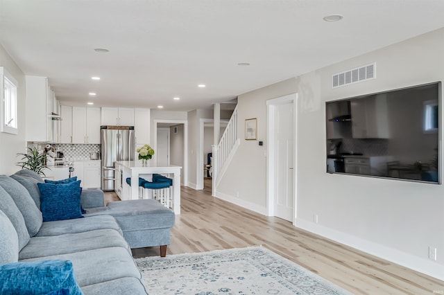 living room featuring light hardwood / wood-style flooring