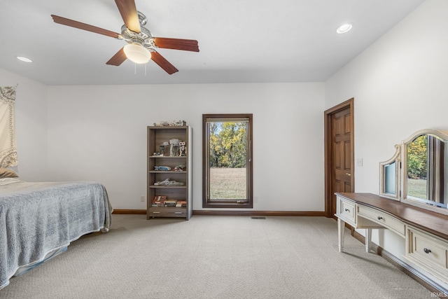 carpeted bedroom featuring ceiling fan