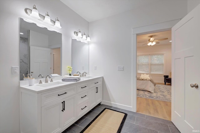 bathroom featuring vanity, wood-type flooring, and ceiling fan