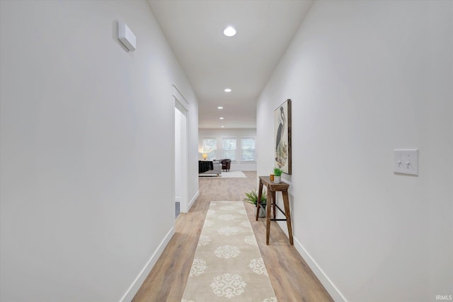 corridor featuring light wood-type flooring