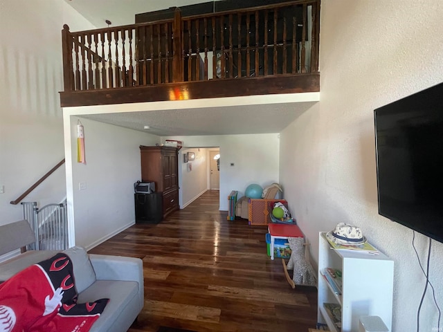 living room featuring dark wood-type flooring