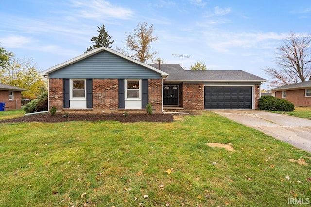 ranch-style house featuring a garage and a front lawn