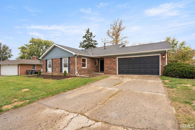 ranch-style house with a garage and a front lawn