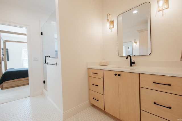 bathroom with vanity, tile patterned flooring, and an enclosed shower