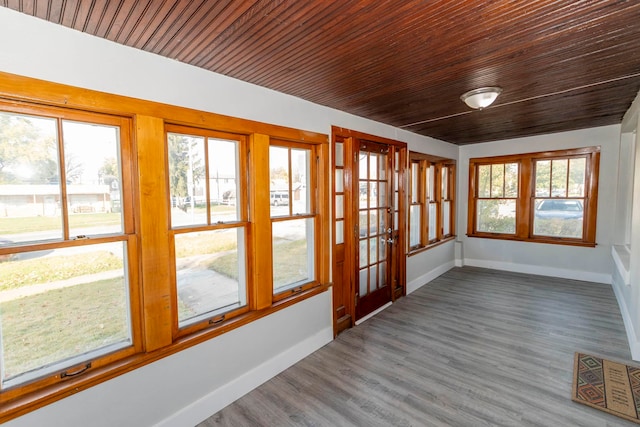 unfurnished sunroom with a wealth of natural light