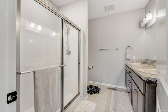 bathroom featuring vanity and walk in shower