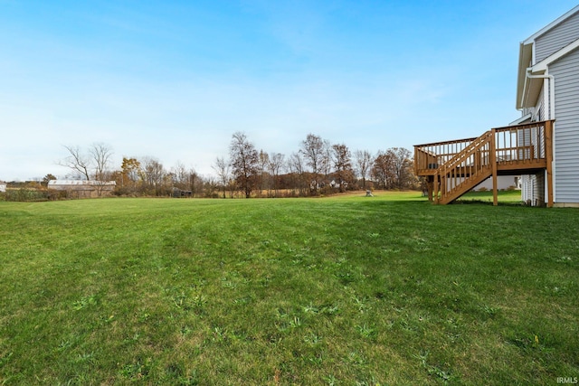 view of yard with a deck